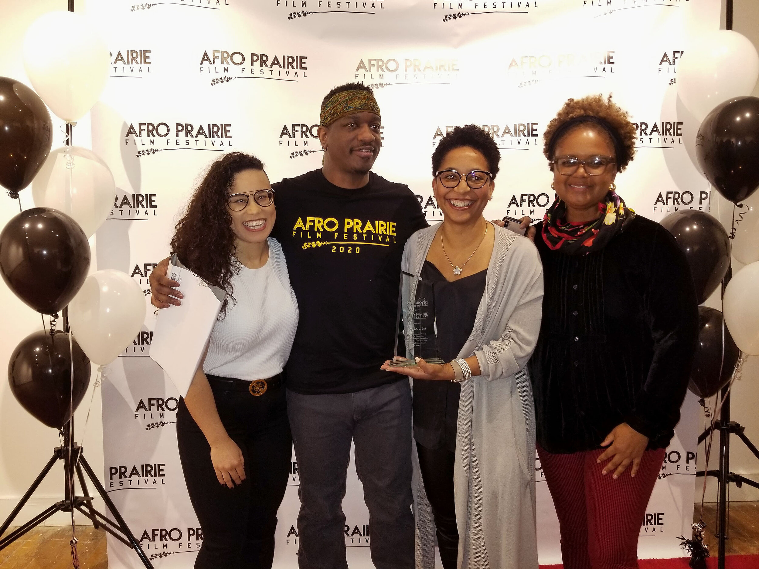 Photo/Shondell Orinthia Babb | (L-R) Alexa Joy, Ben Williams, Joy Lowen, Tonya Williams | Afro Prairie Film Festival and Reelworld Film Institute jointly presented the Black Leadership Award of Distinction to Joy Lowen, CEO, National Screen Institut…